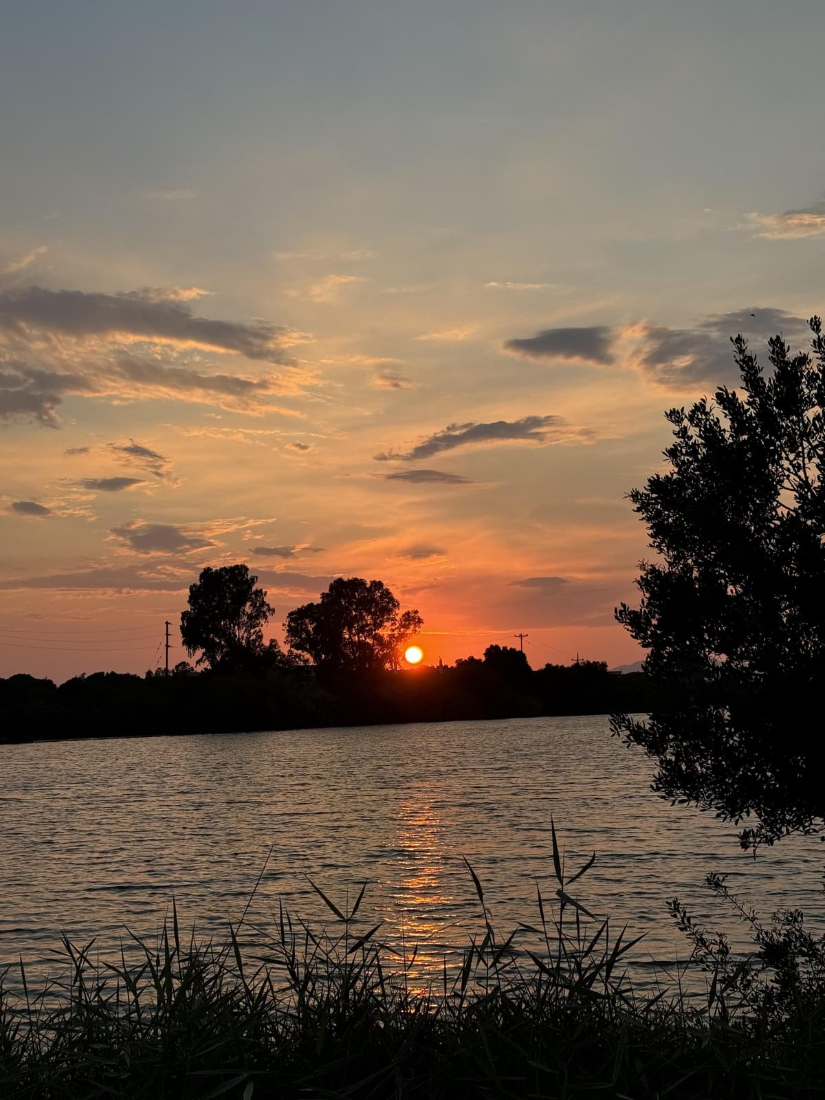 Serene sunset over Koronisia waters